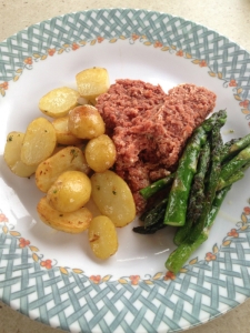 tinned corned beef with fresh potatoes and asparagus